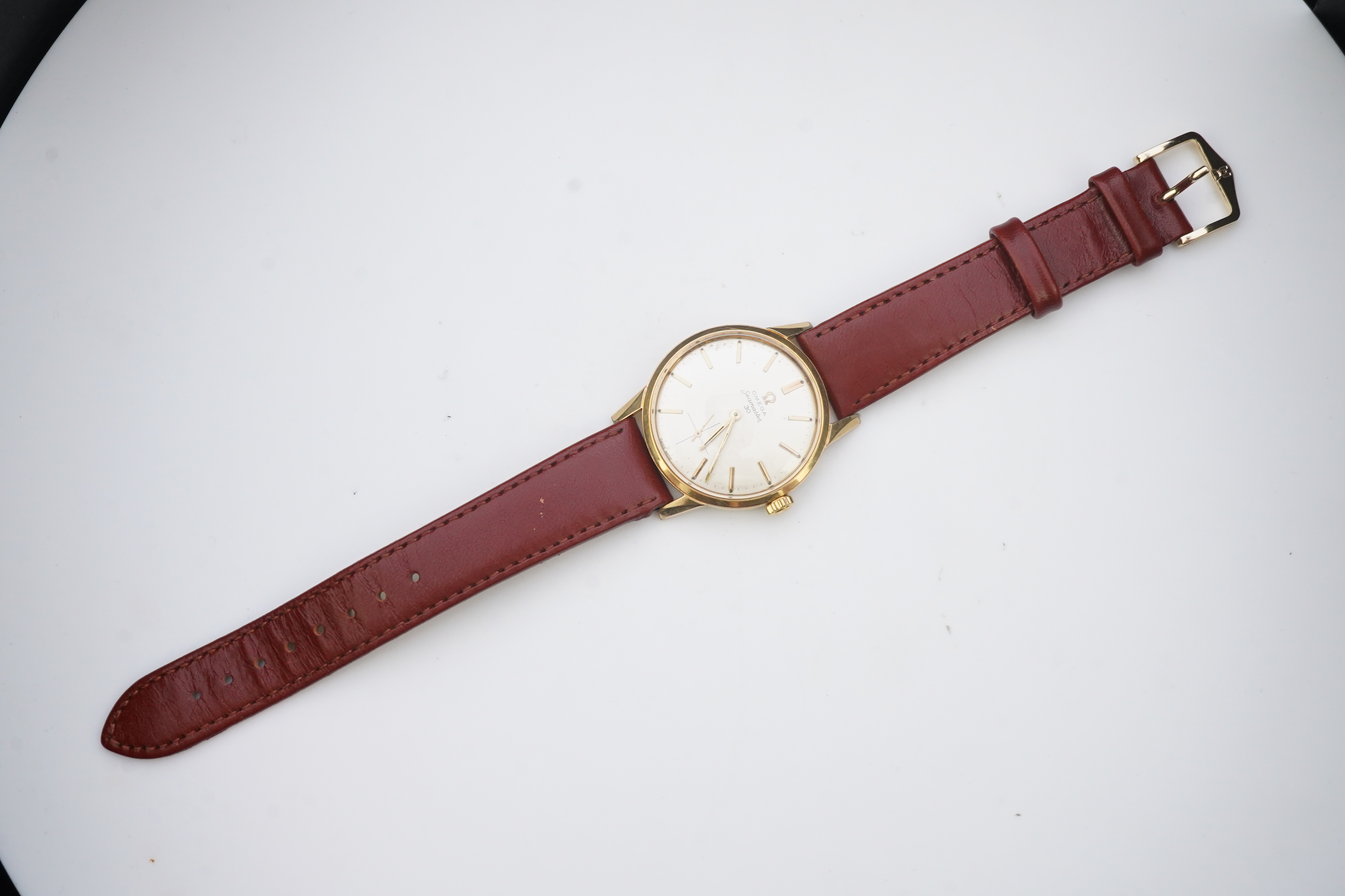 A gentleman's steel and gold plated Omega Seamaster 30 manual wind wrist watch, on a later associated leather strap